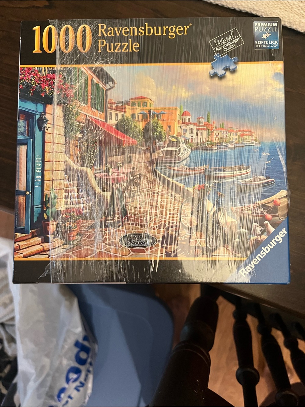 Ravensburger Coastal Harbor Puzzle with Blue, Turquoise, Yellow and Red Artwork